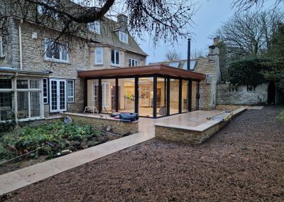 Glass extension for traditional oxfordshire house by Lakeridge Solutions.