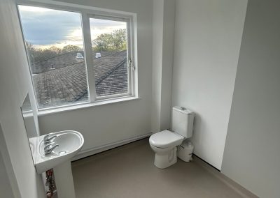 Bathroom refurbishment, plumbing installation, electrics, wetroom, flooring and decoration. Hoth Brain Centre, healthcare construction project.