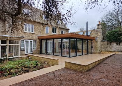 External view of residential extension project plus patio and footpath. Lakeridge solutions, Oxfordshire.